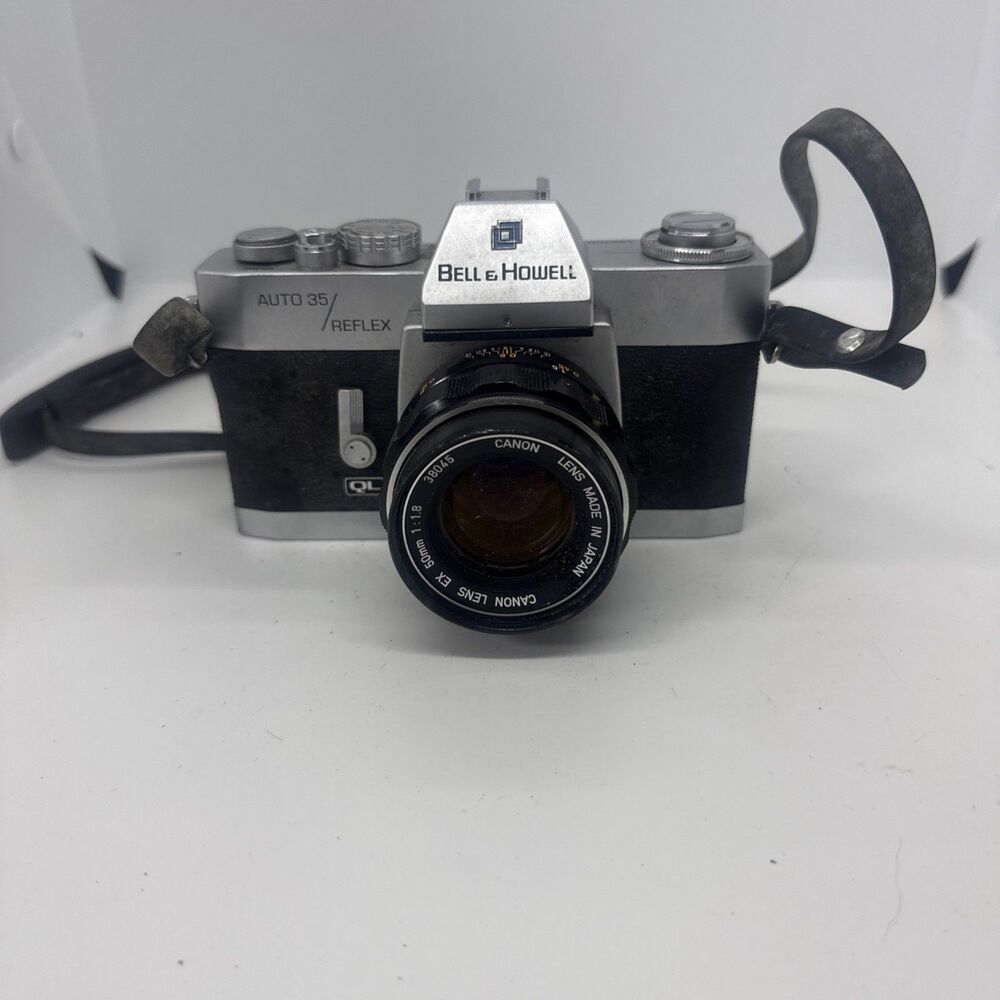 Bell & Howell 35mm Auto 35 Reflex SLR design 237 With vintage case- Working
